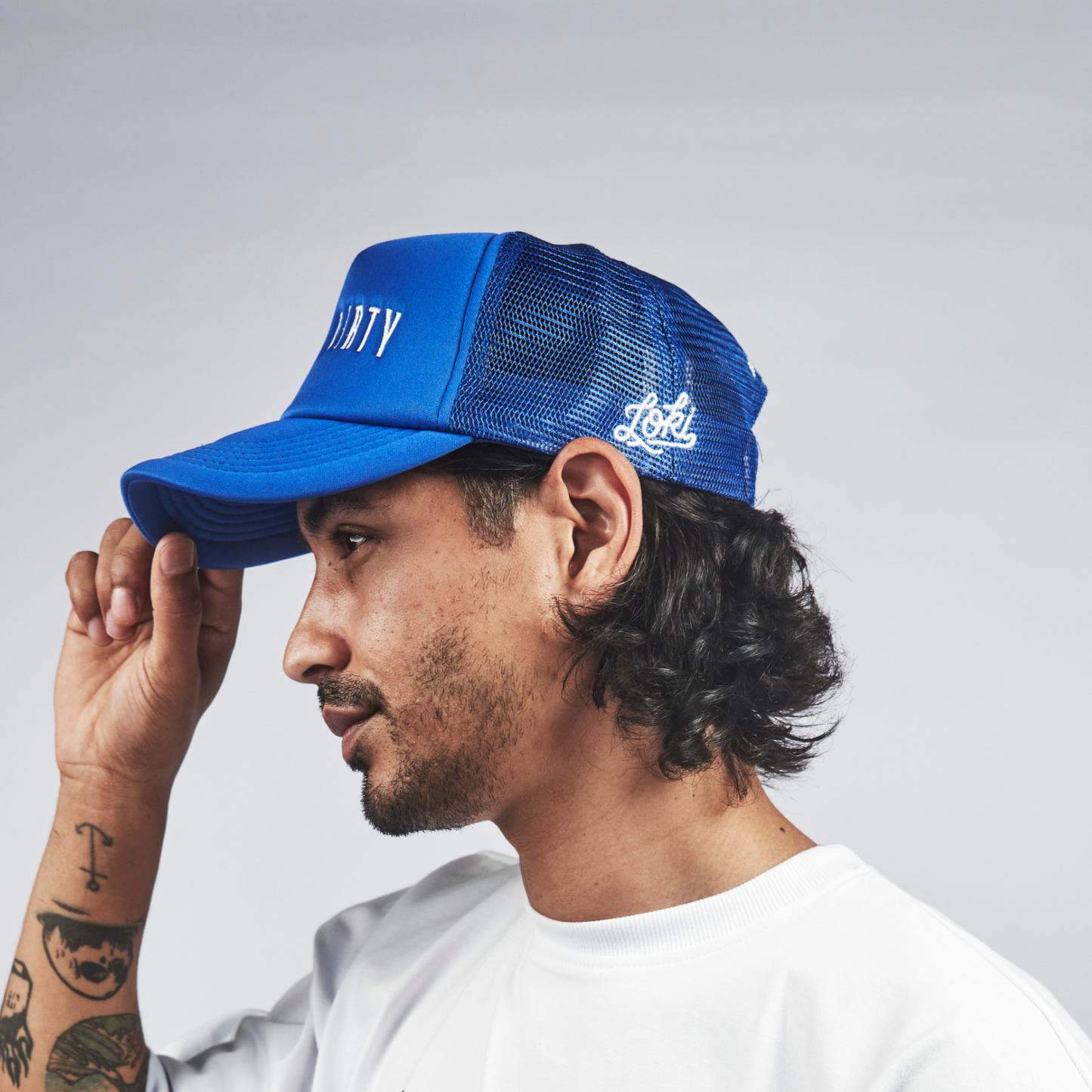 Cobalt blue "PLAY DIRTY" Trucker